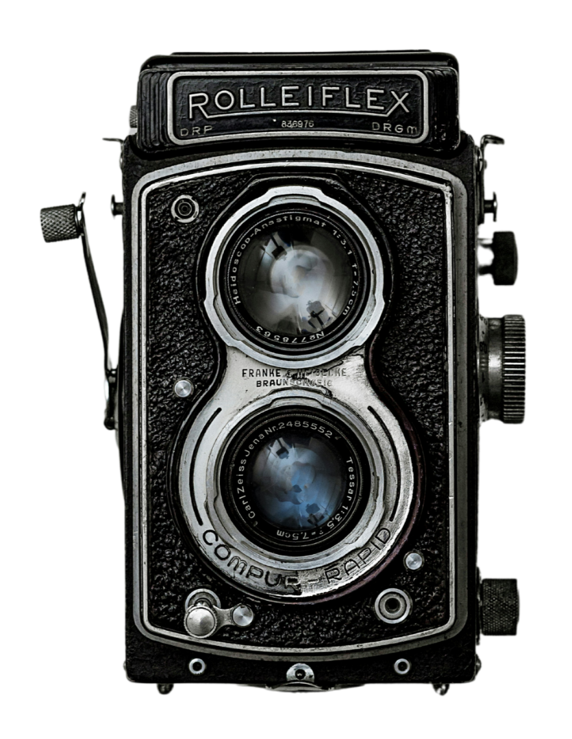 A vintage Rolleiflex twin-lens reflex camera with dual lenses, made by Franke & Heidecke in Germany, featuring a black textured body and manual controls.