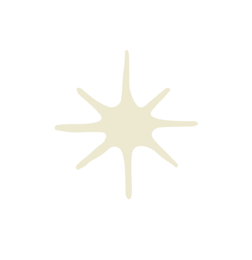 A star-shaped object with elongated points against a black background.