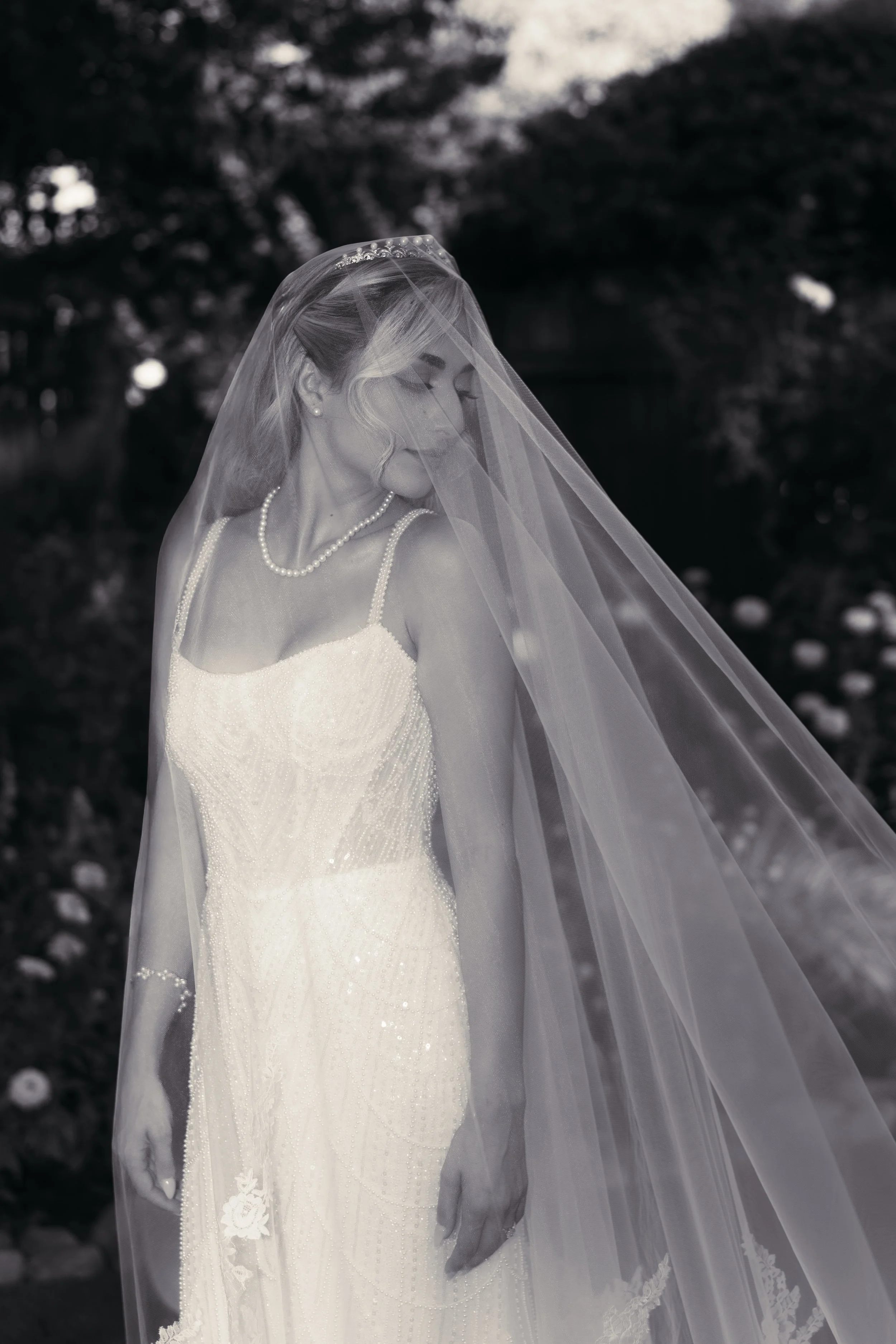 Editorial bridal portrait of a bride in a veil during a Bay Area wedding, photographed by Lei Photography Collective in natural light.