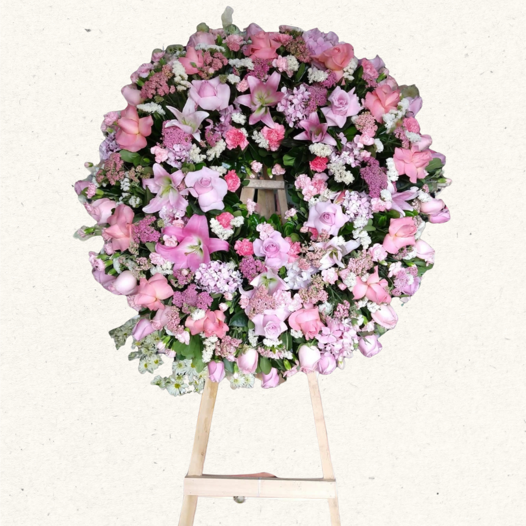 CORONA EN TONOS ROSAS