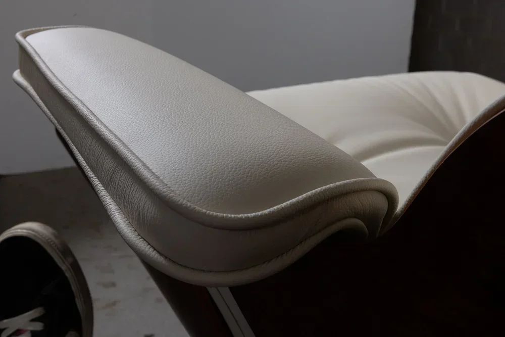 Eames lounge chair with new leather cushions