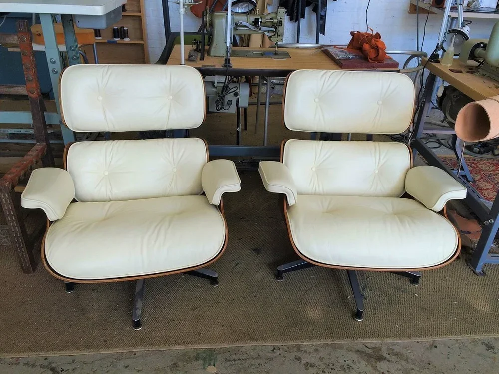 Eames lounge chairs with new white leather