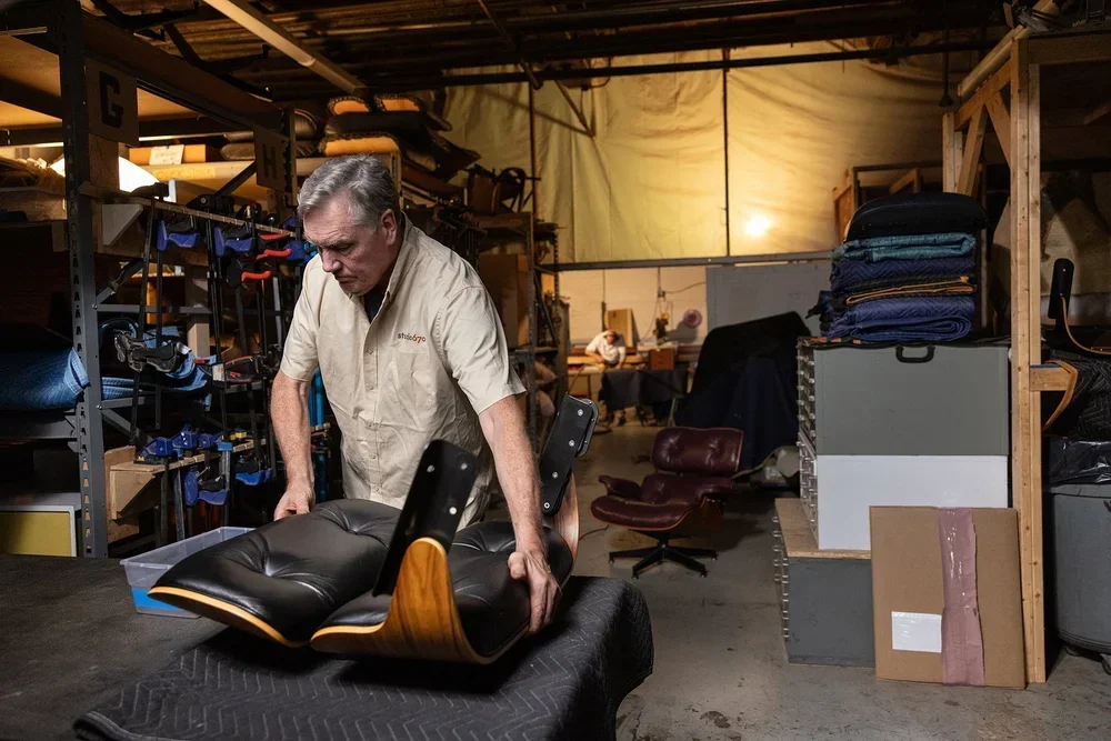 Assembling an Eames lounge chair
