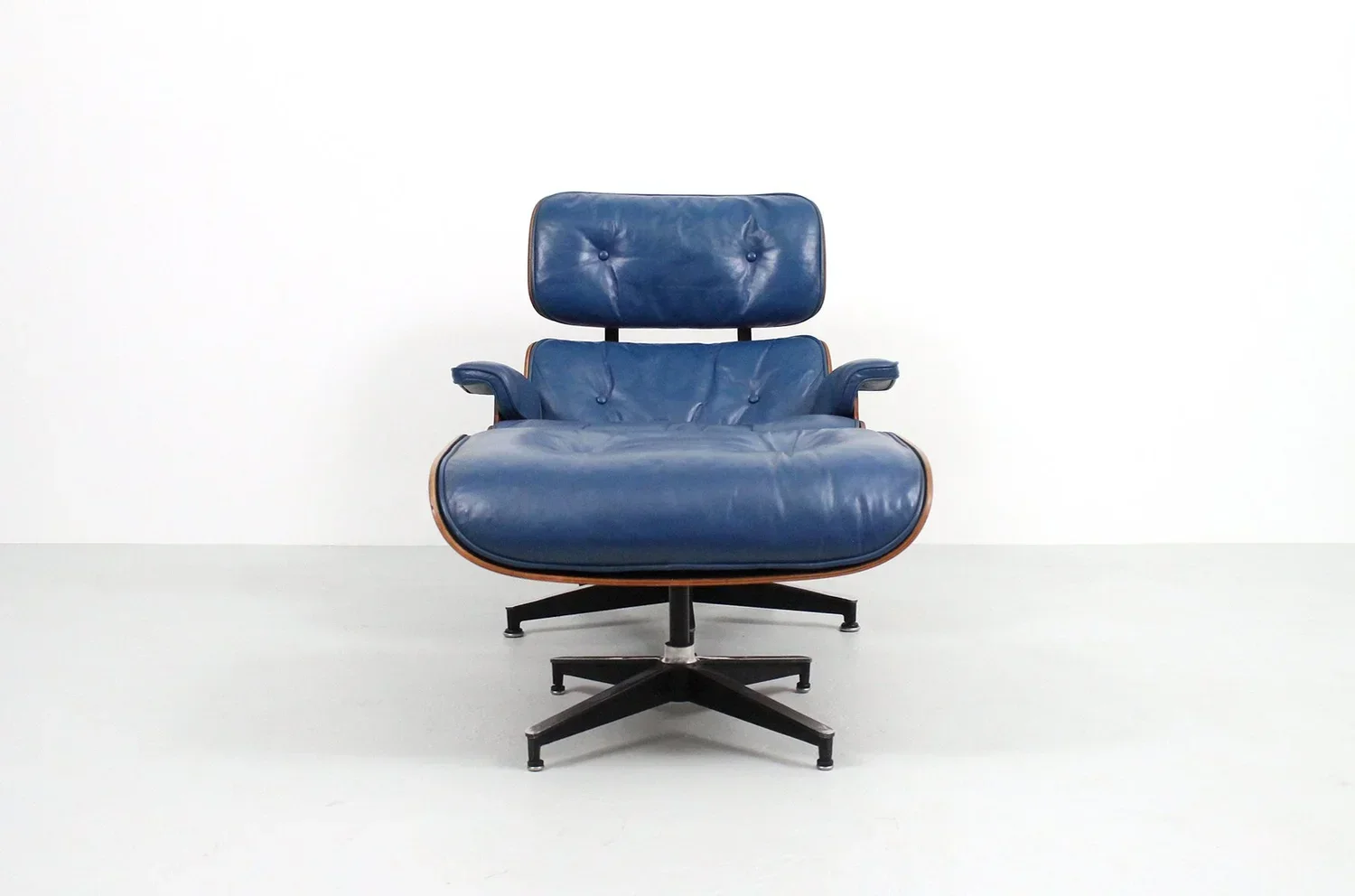 Blue restored Eames lounge