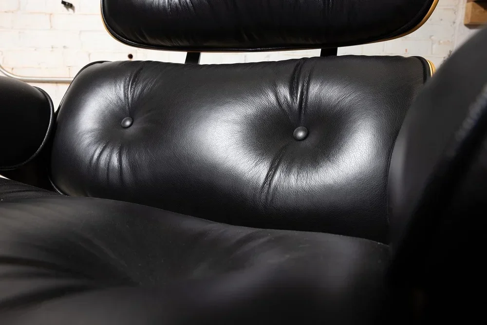Eames lounge chair with new black leather