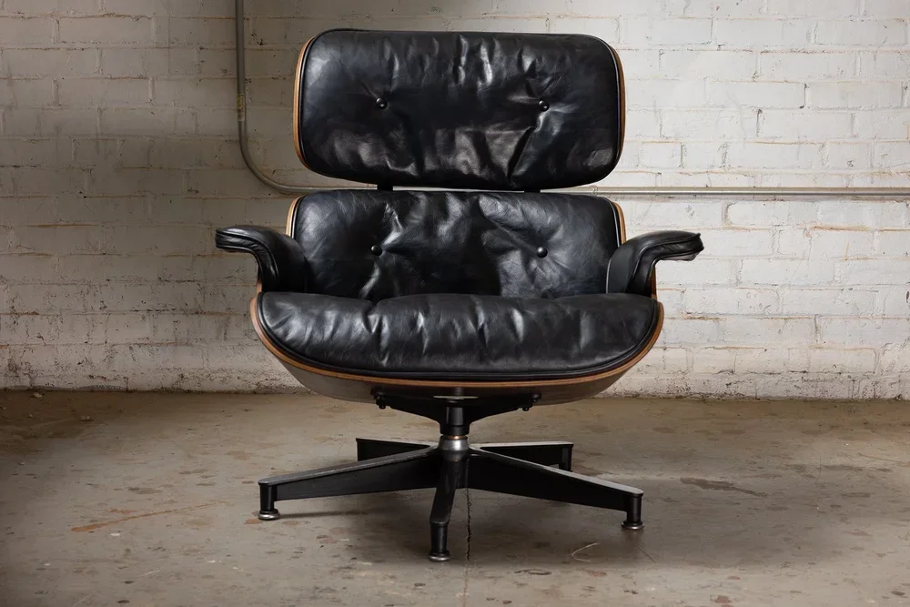 Black Eames chair restoration