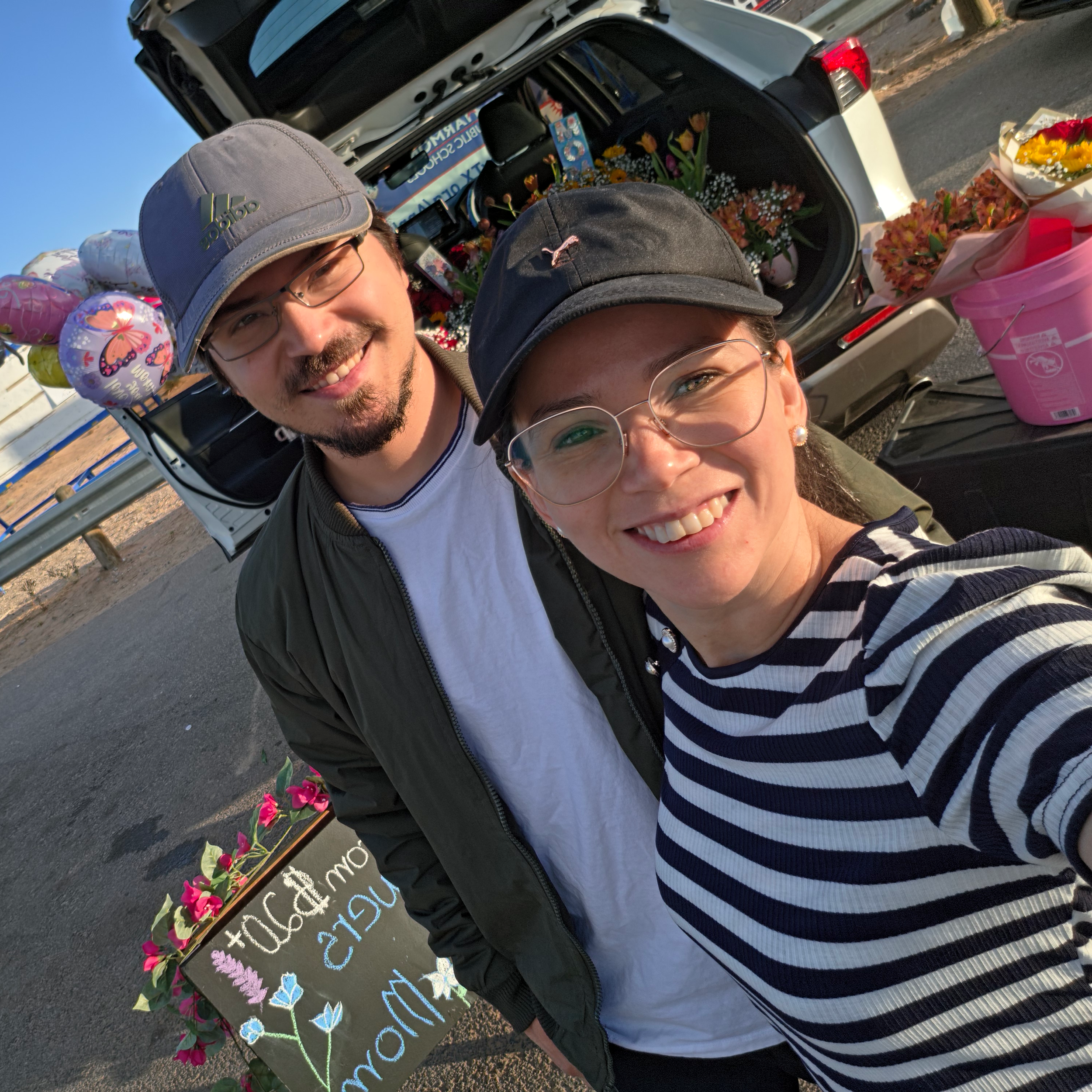 Infinity Flowers owners at a local flower and gift setup in El Paso
