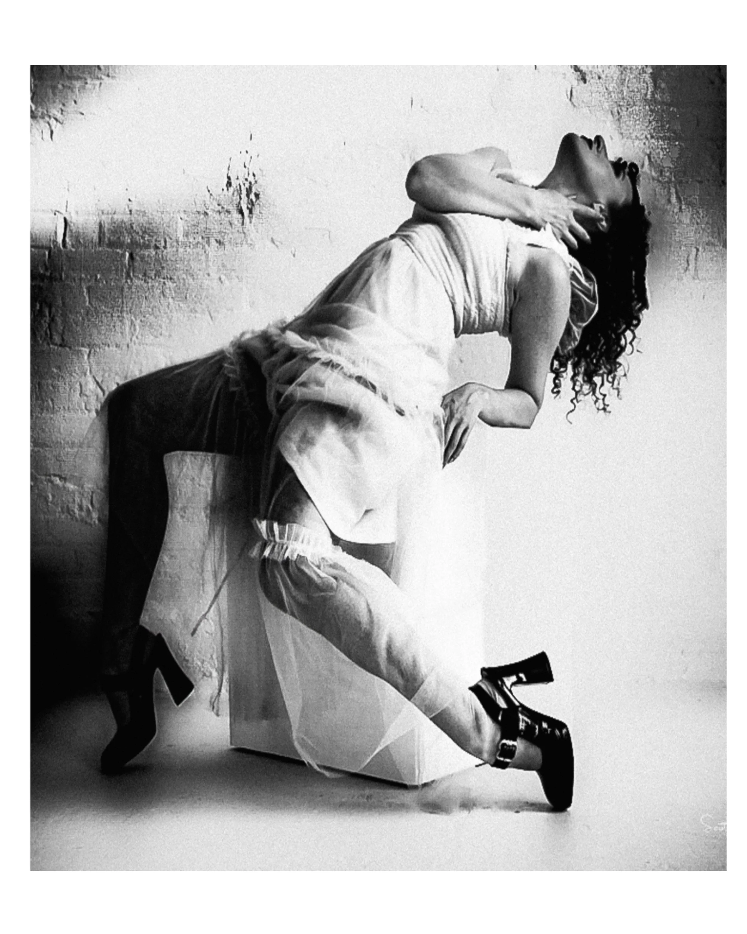Creative fashion portrait featuring expressive movement and editorial styling during a ScottyD TFP collaboration in Dayton, Ohio.
