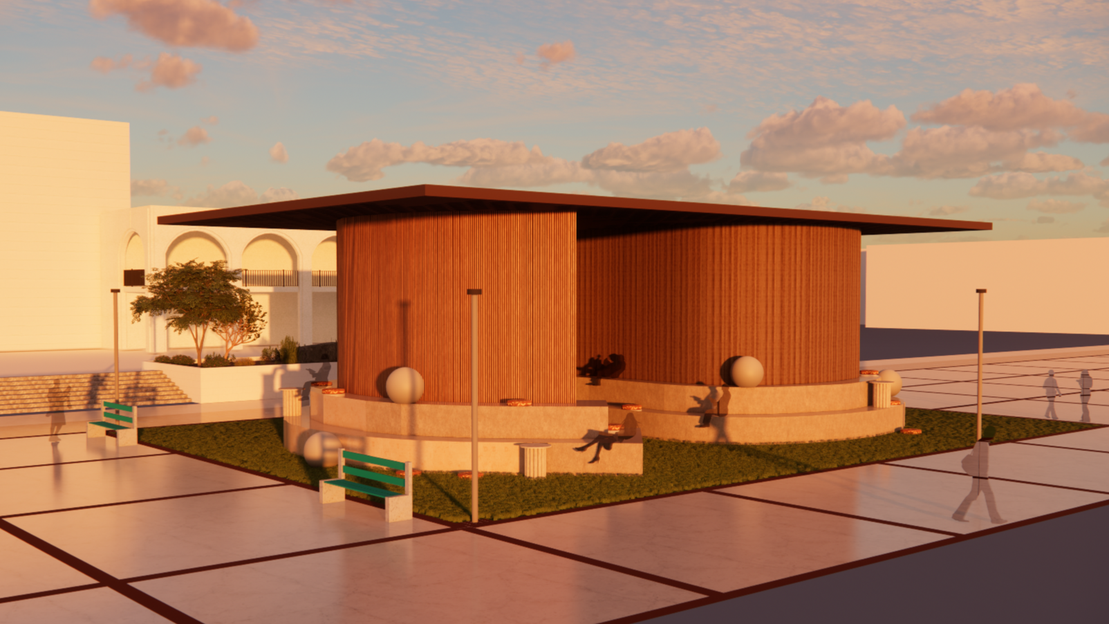 A modern circular wooden pavilion with a flat roof, surrounded by benches, spherical ornaments, and street lamps, in an outdoor plaza at sunset.