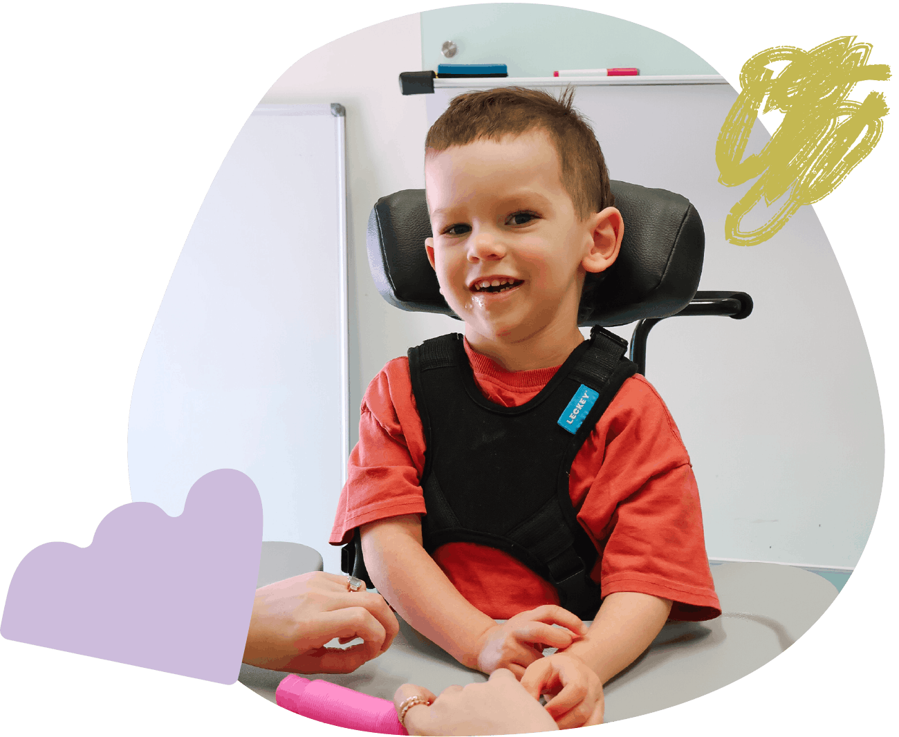 Child and therapist interacting during a structured assessment session at Little Bodies Therapy