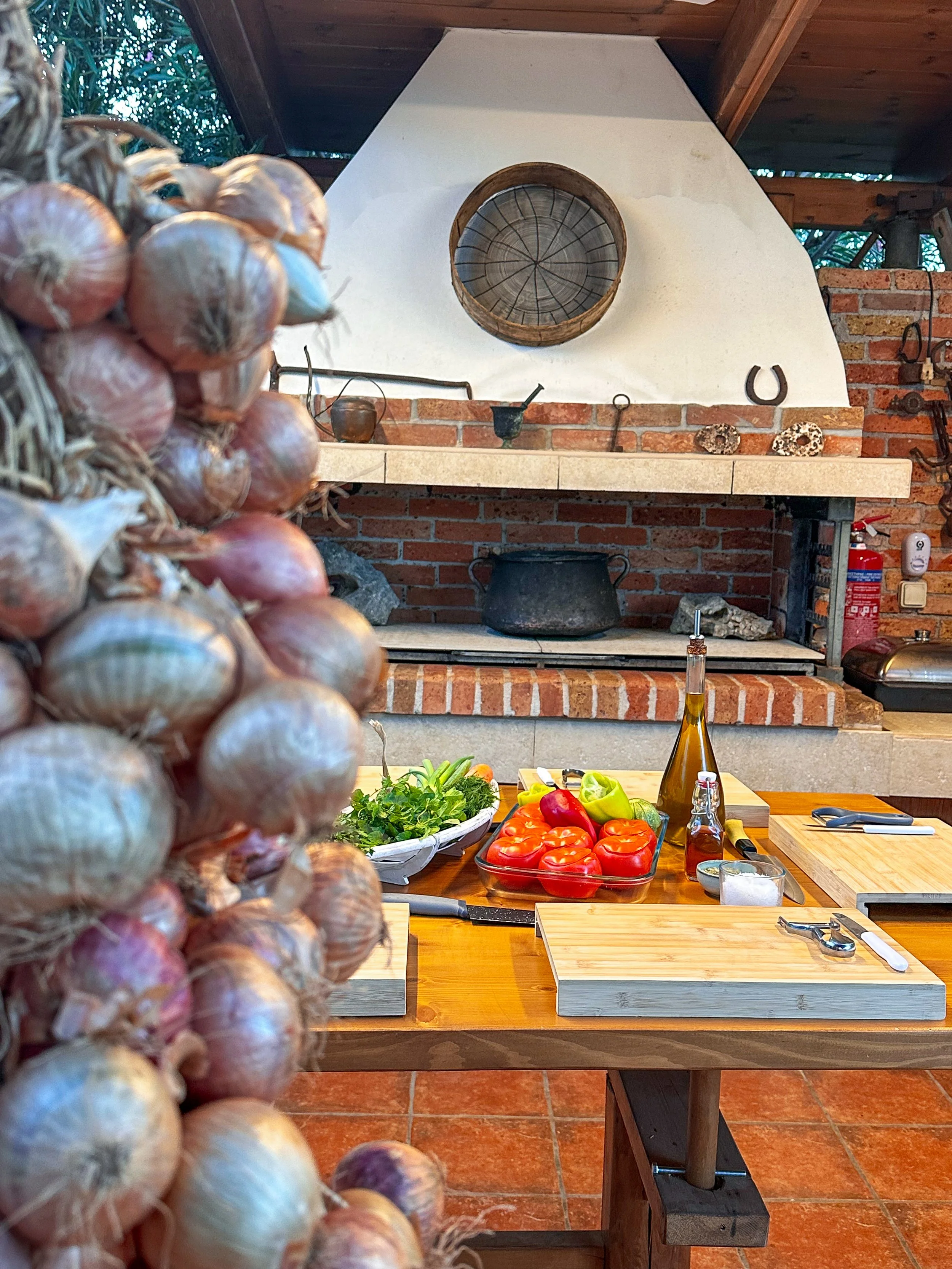 Woodfired oven with clay pot and coals.