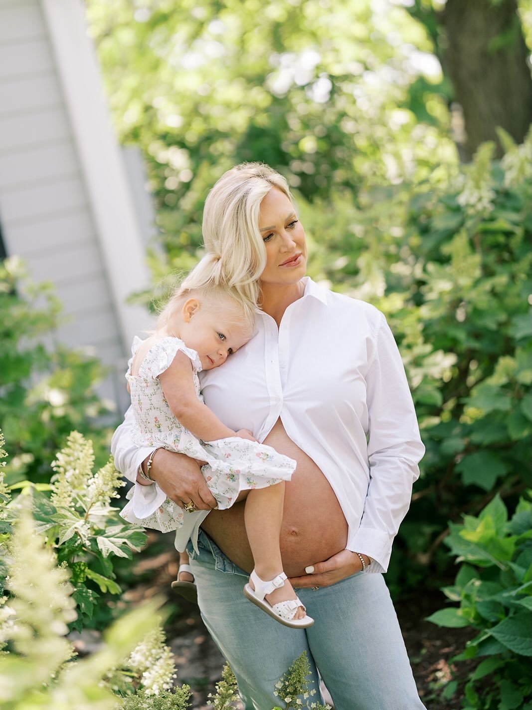 The first time, every photo was about becoming a mother. This time, it&rsquo;s about watching your family grow. Tiny hands resting on a growing belly. Curious questions. Sweet hugs that linger a little longer. The quiet moments before life changes fo