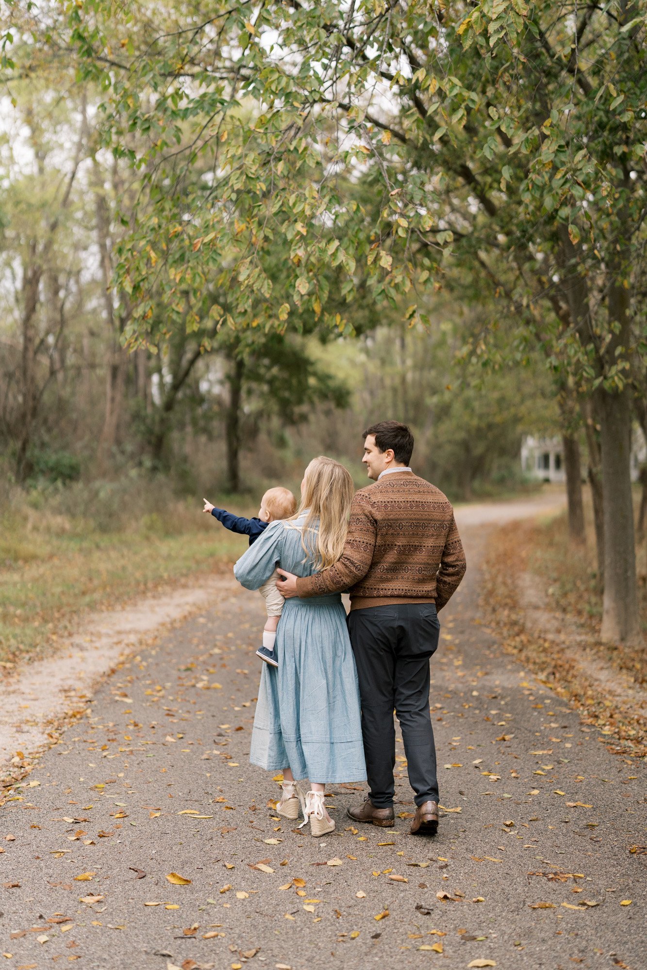 Family walking together during fall session in St. Louis, Missouri by Tristan Singleton Photography
