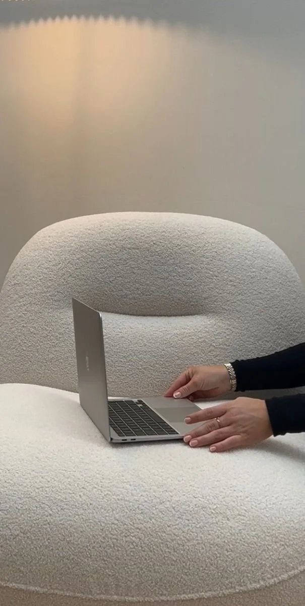 Geometric drawing of an outline square with sections divided by vertical, horizontal, and half circle lines.