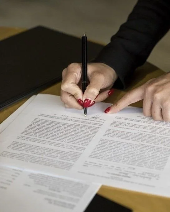 Geometric drawing of an outline square with sections divided by vertical, horizontal, and circle lines.