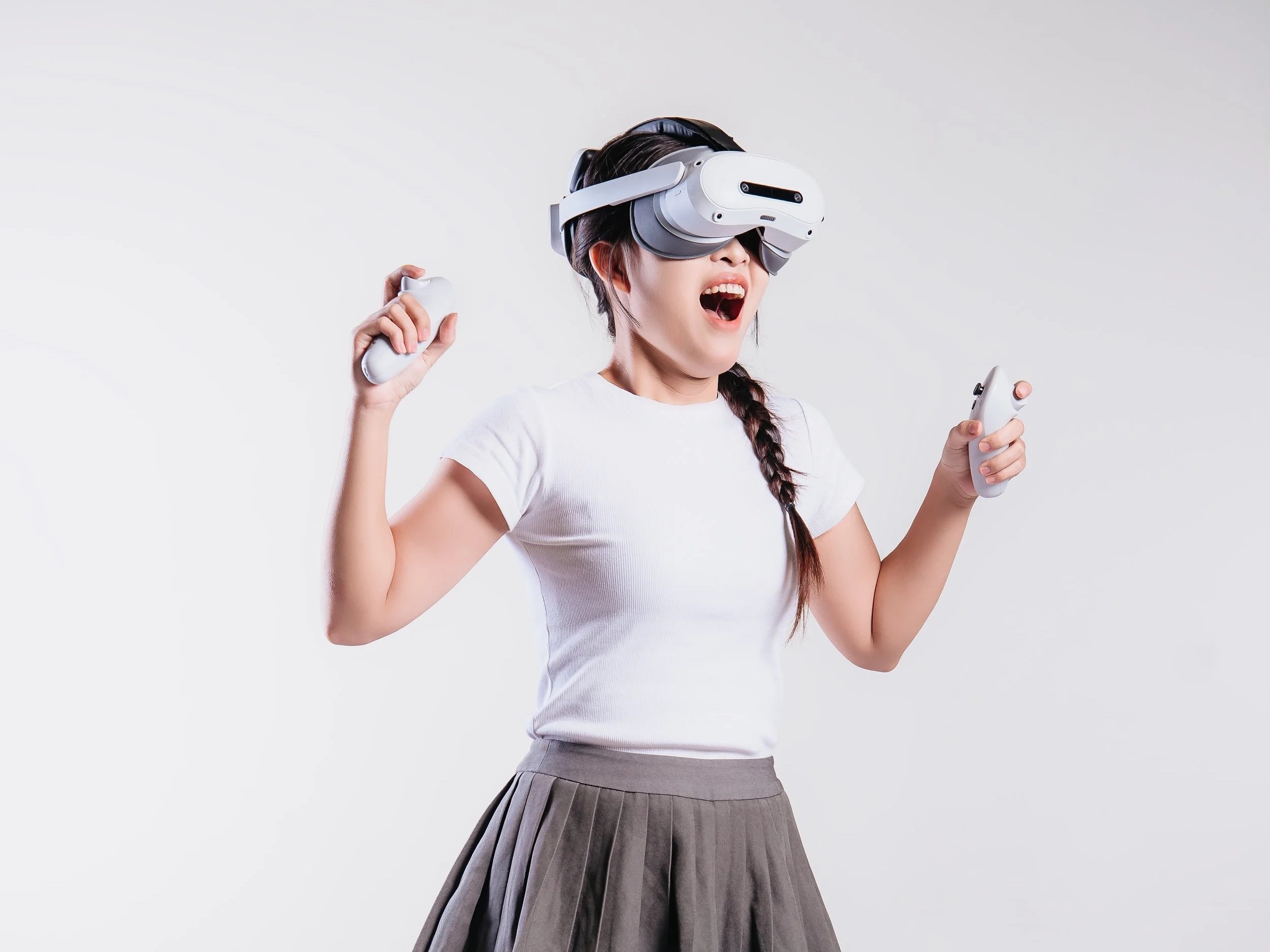 Young woman playing VR game – VRena experience