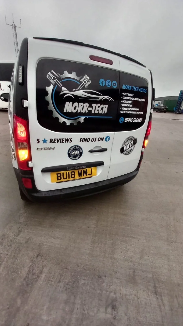 White delivery van with black and blue graphics advertising Morr-Tech Auto repair and reviews, includes contacts and social media icons, license plate BU18 WMJ.