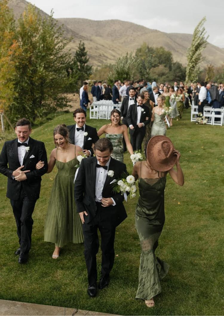 Wedding guests walking outdoors