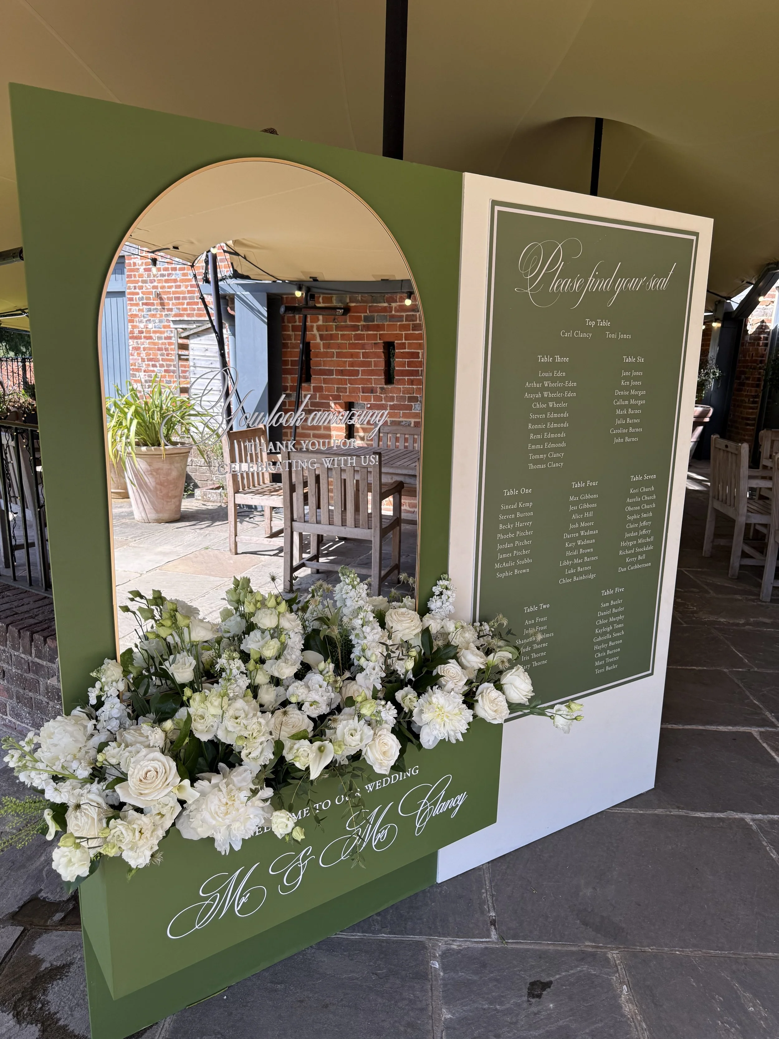 Bespoke made seating plan and welcome sign combined with multi interactive custom design using a mirror for selfie purpose and built in flower box wall for a focal point and statement aesthetic