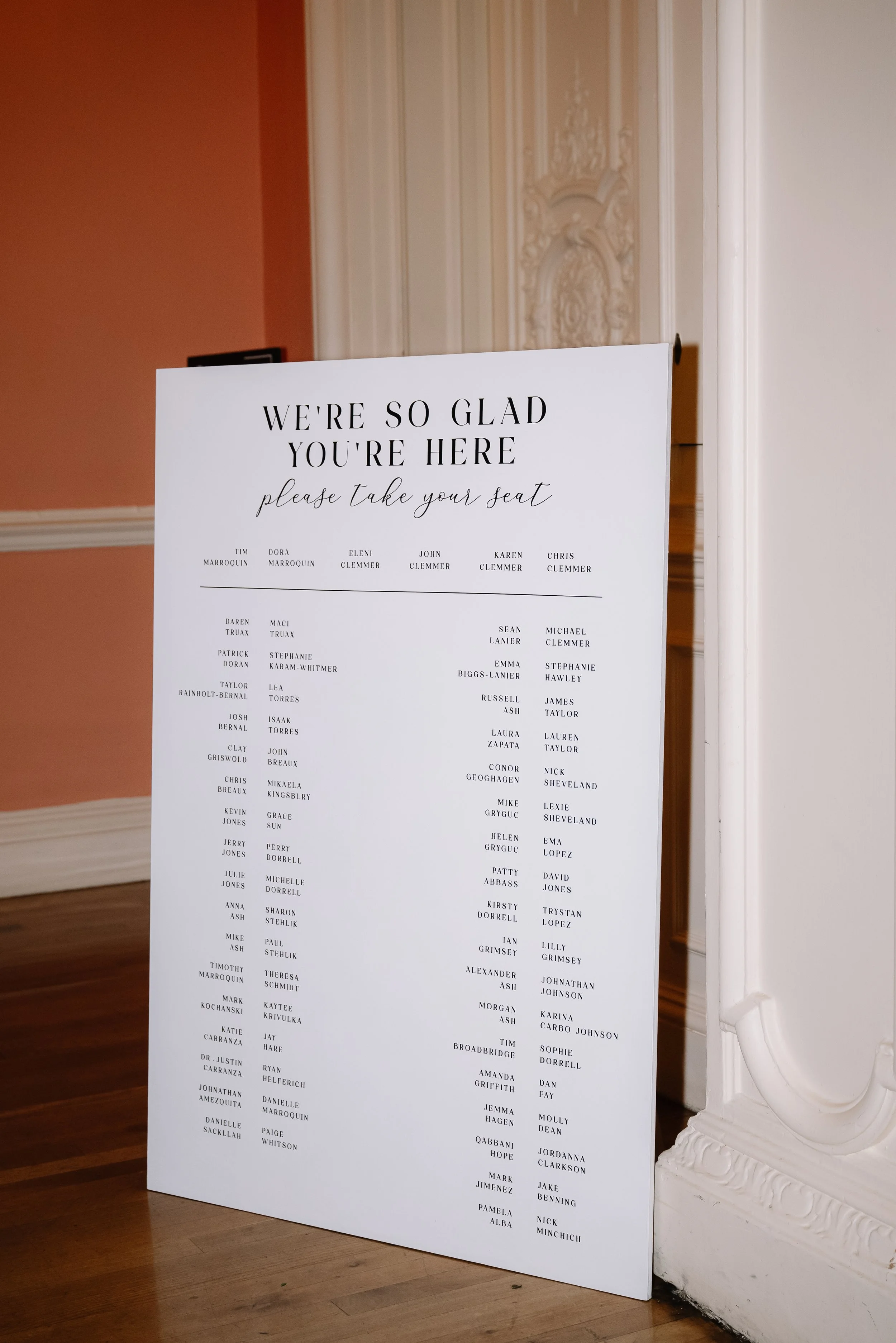 Elegant wedding seating plan display featuring a minimalist design and personalised guest seating arrangement for a luxury wedding reception.
