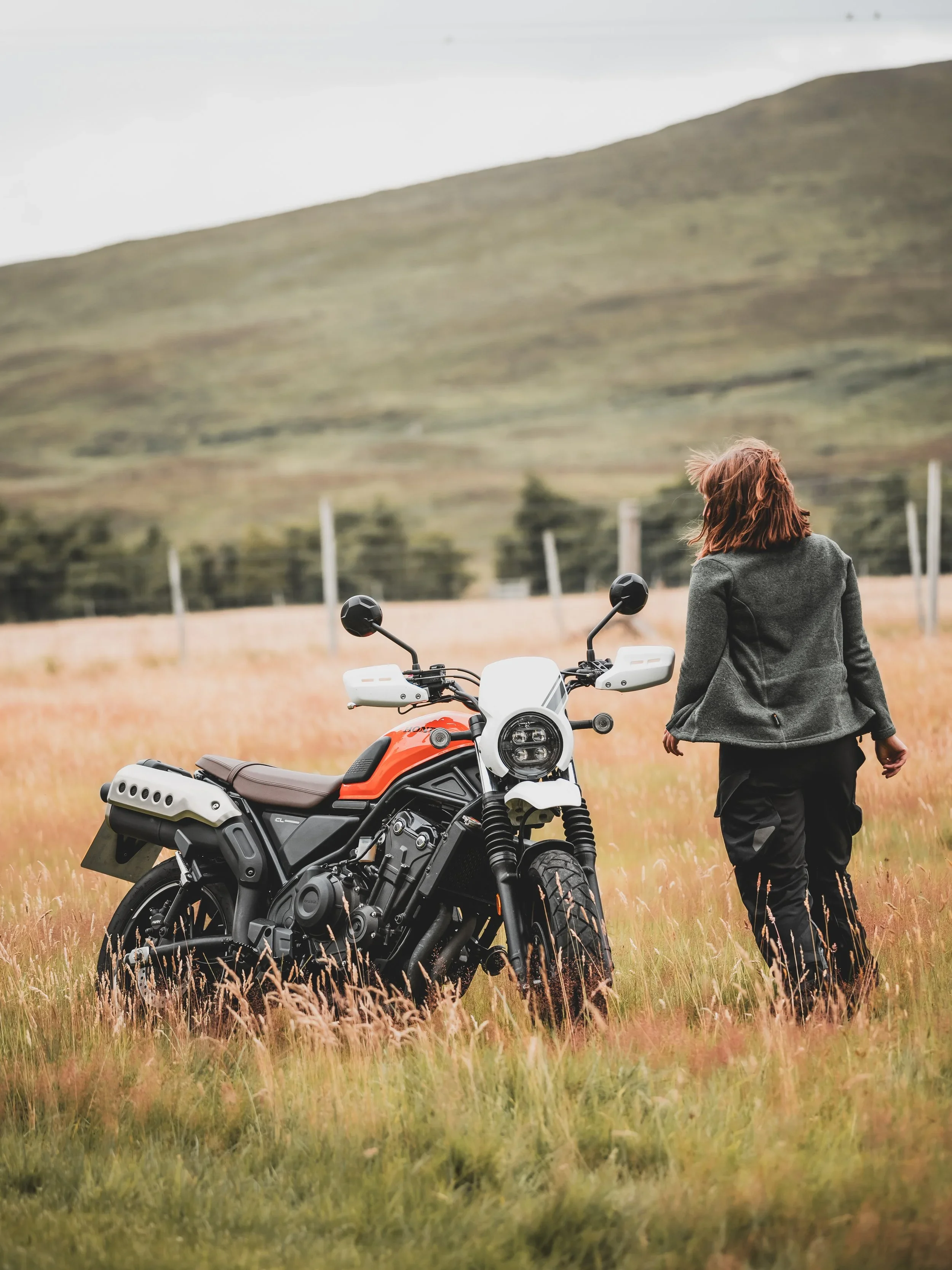 Girl next to CL500 in nature