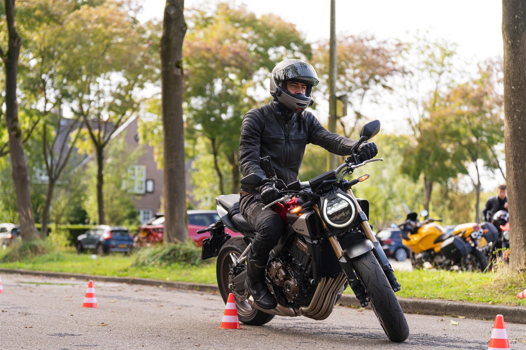 Person practicing slow slalom on Honda CB650R with E-clutch