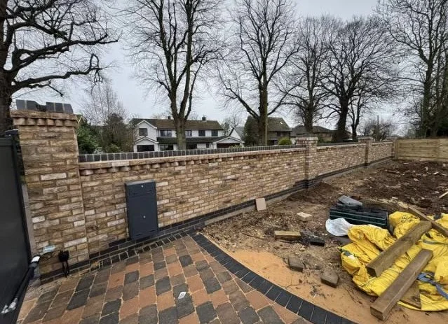 Brick wall completed by Grantham builder G East Builder