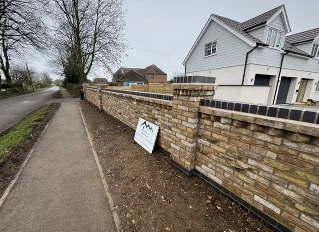 Brick wall completed by Grantham builder G East Builder