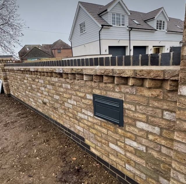 Brick wall completed by Grantham builder G East Builder