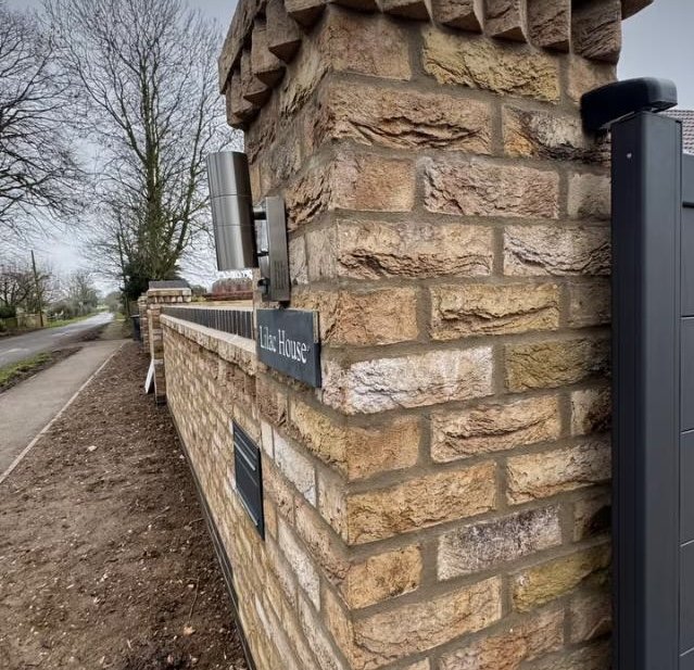 Brick wall completed by Grantham builder G East Builder