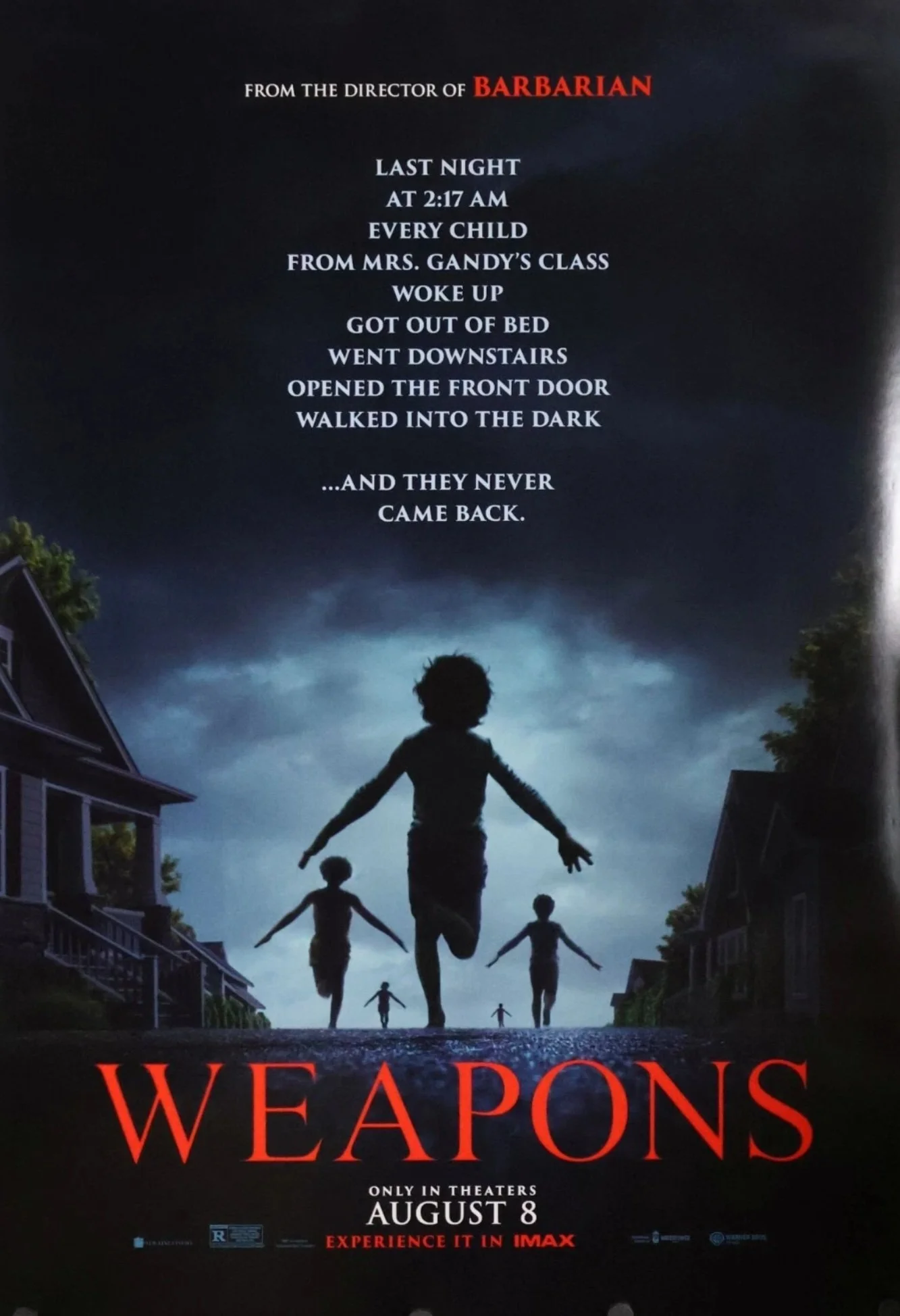 Movie poster for 'Weapons' with silhouettes of children running on a street at dusk, with houses on either side and a cloudy sky overhead. Text includes review quote, release date August 8, and IMAX experience.