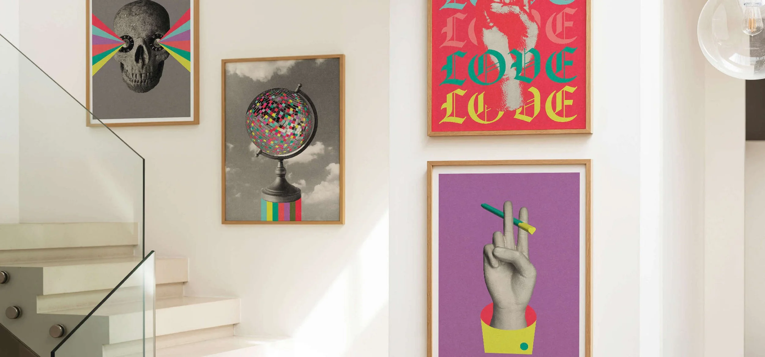 Gallery wall with colourful, pop art inspired posters featuring skulls, peace signs, guns, and abstract designs with rainbow and vibrant color schemes by Graphic artist Paul Scott. Shop now at paulscott.studio ©2026 Liberty Creative Ltd.