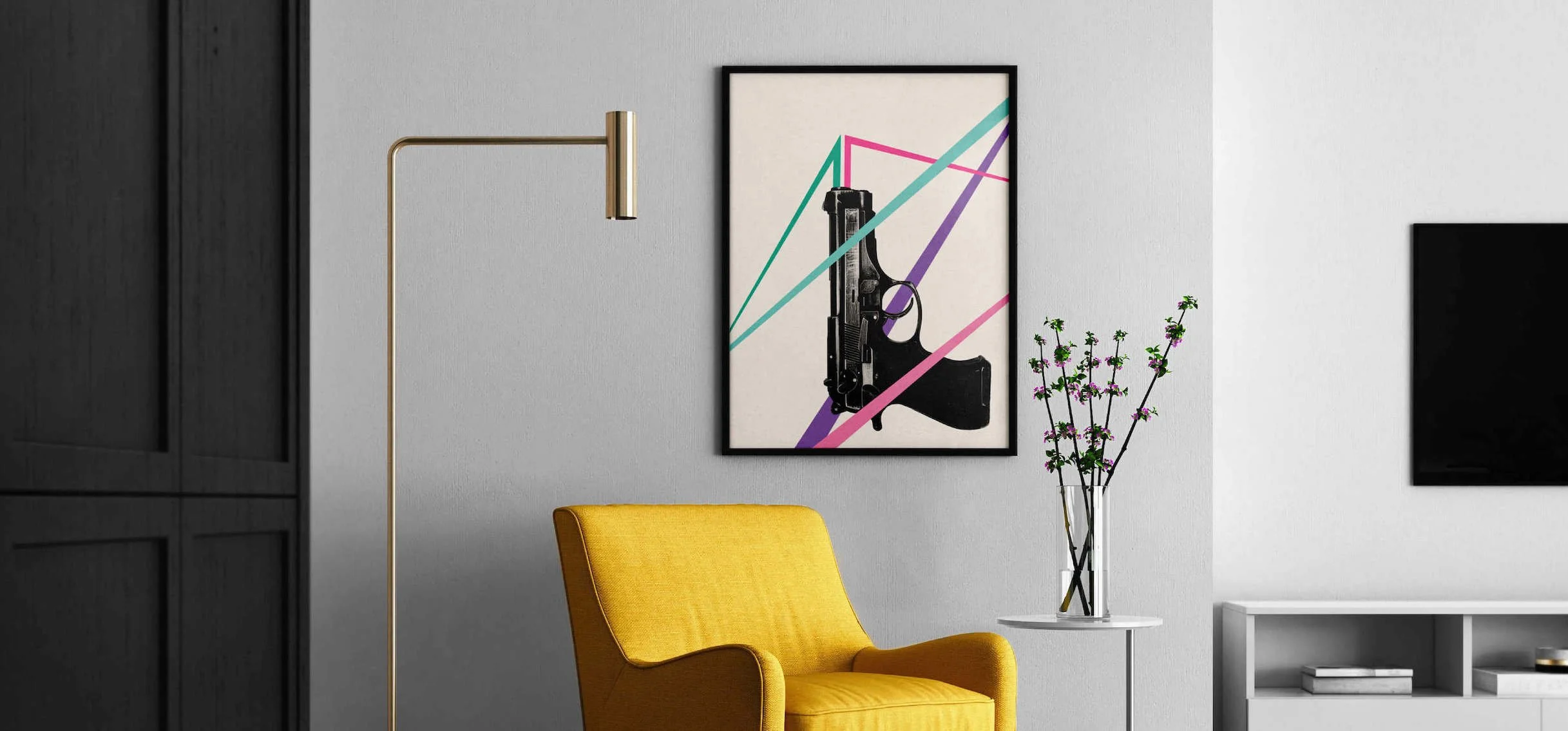 Contemporary living room with yellow armchair, Friendly Fire artwork by graphic artist Paul Scott hangs on the wall. A white vase with pink and purple flowers.