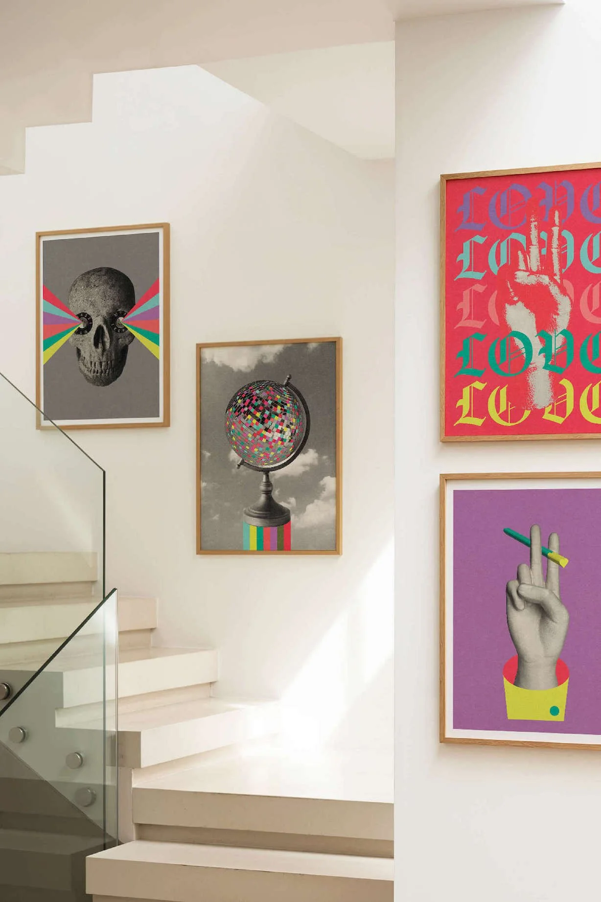 Gallery wall with colourful, pop art inspired posters featuring skulls, peace signs, guns, and abstract designs with rainbow and vibrant color schemes by Graphic artist Paul Scott. Shop now at paulscott.studio ©2026 Liberty Creative Ltd.