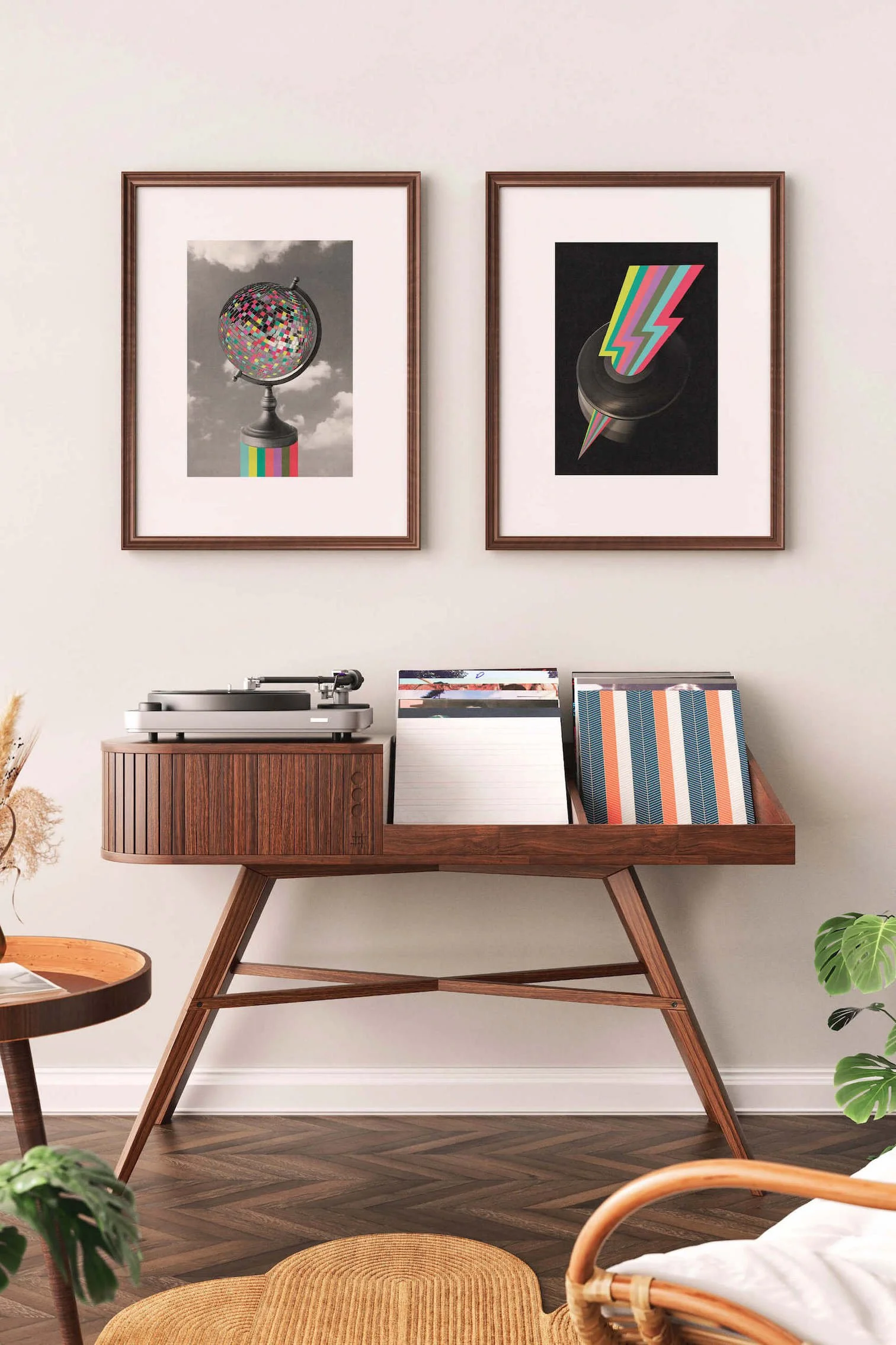 A vintage wooden record player with records and colourful cover art on it, against a white wall with two framed modern art prints by graphic artist Paul Scott. www.paulscott.studio

©2026  Paul Scott. Liberty Creative Ltd.