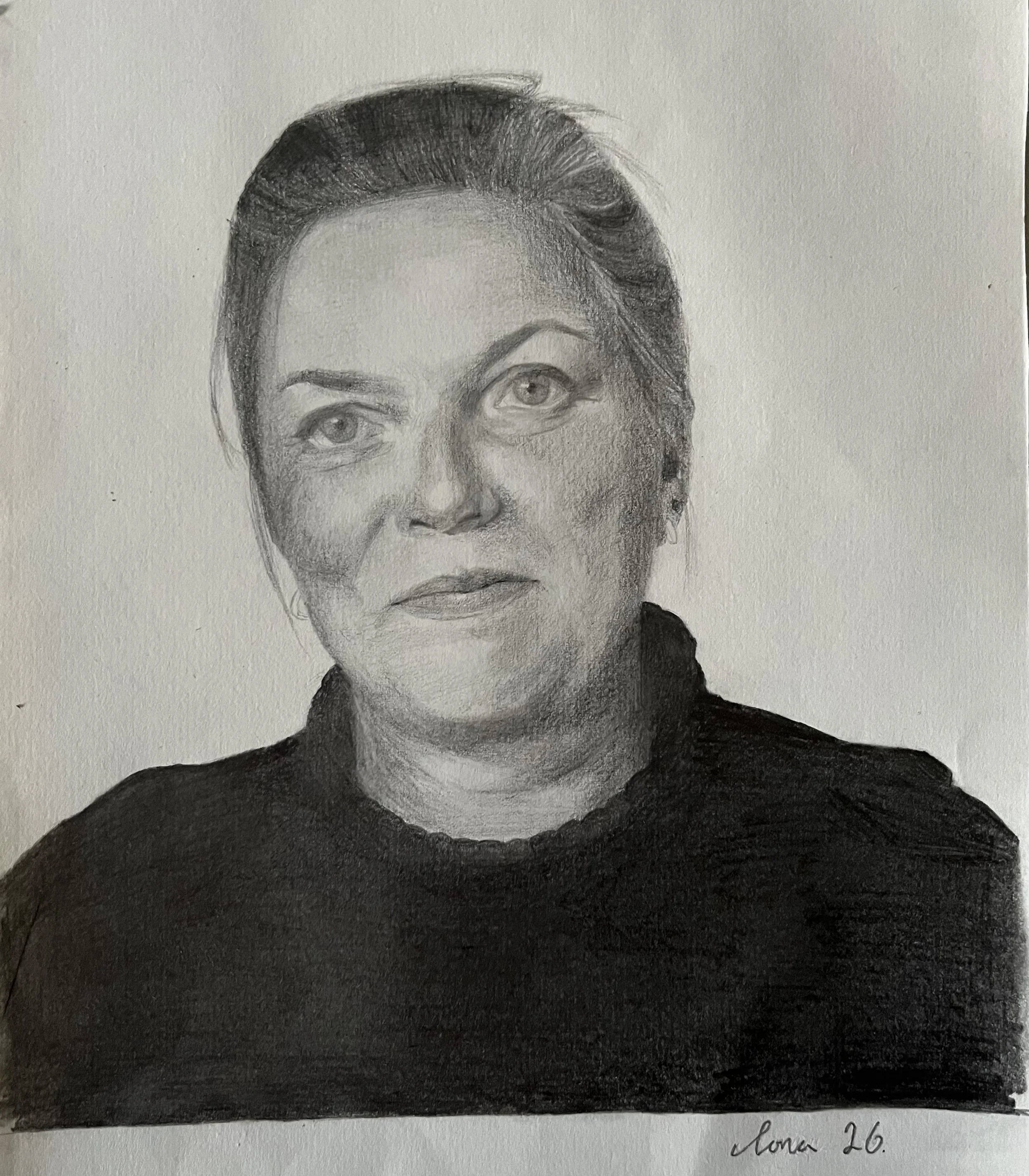 A pencil sketch of a woman's face focusing on her eyes, eyebrows, and lips with her hair styled up. The sketch is signed at the bottom right corner with the name 'Lona 26'.