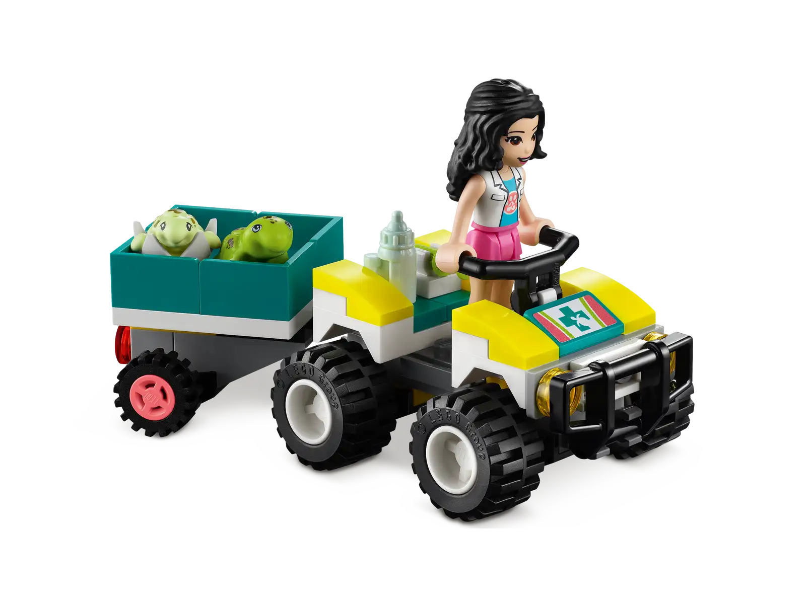 LEGO ambulance toy with a female minifigure driver and two small dinosaur figures in a cargo bed.