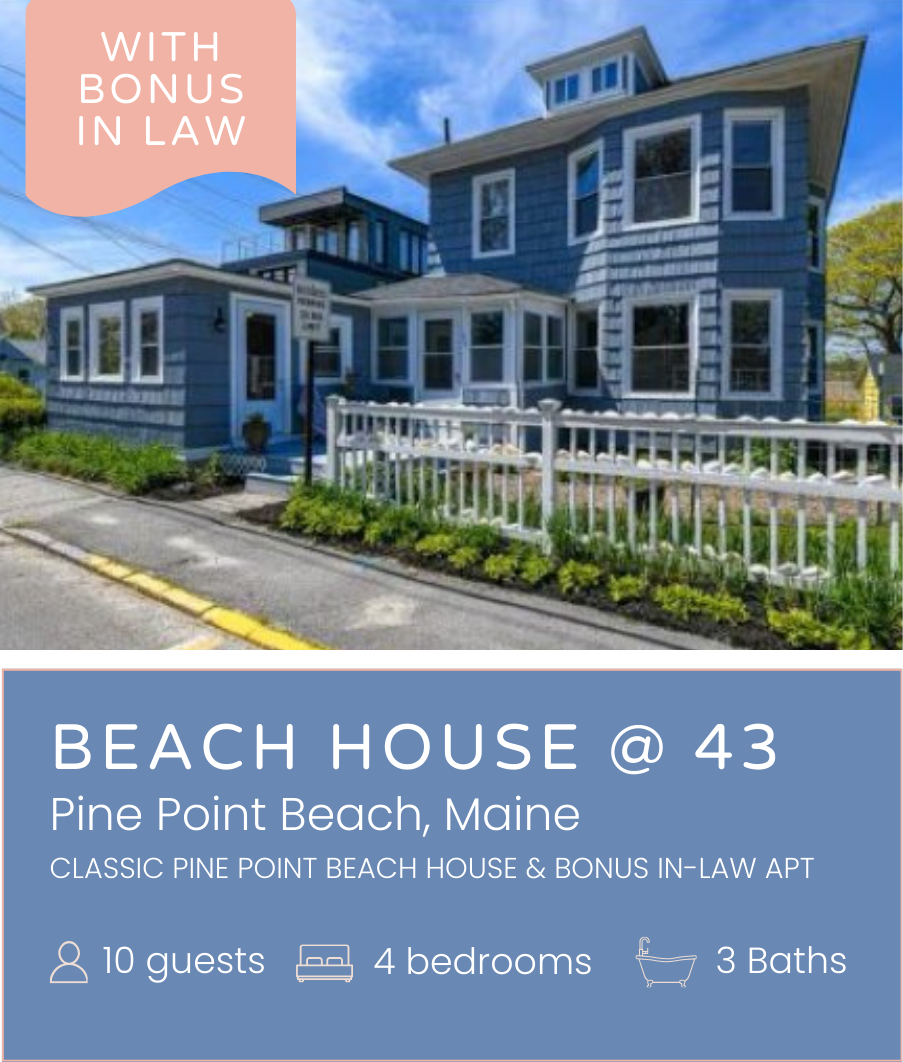 A blue, multi-story beach house with white trim and a white picket fence in Pine Point Beach, Maine, under a partly cloudy sky. A pink speech bubble with white text that reads 'With Bonus In Law'.