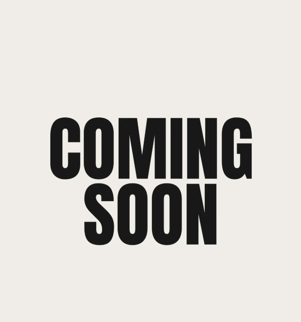 Text that reads 'COMING SOON' in bold black letters on a light background.