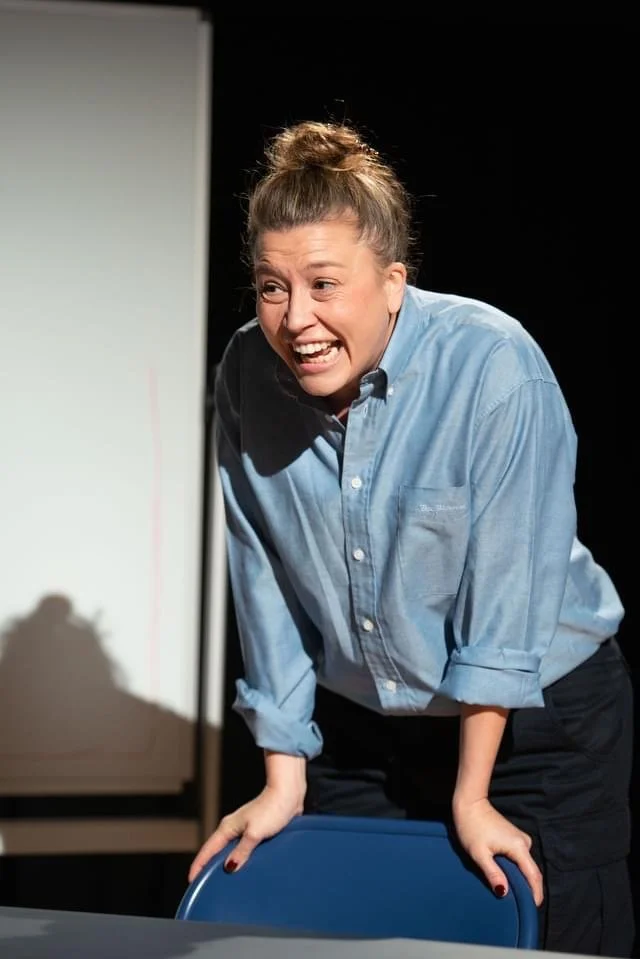 5 Image_A woman leans on a chair.JPG