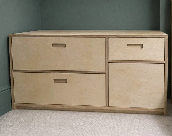 Beech ply with exposed edges and recessed handles. Finely finished for durability