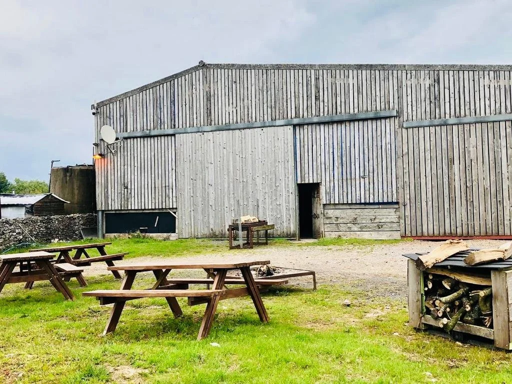 Hay Shed Venue + firewood and benches.jpg
