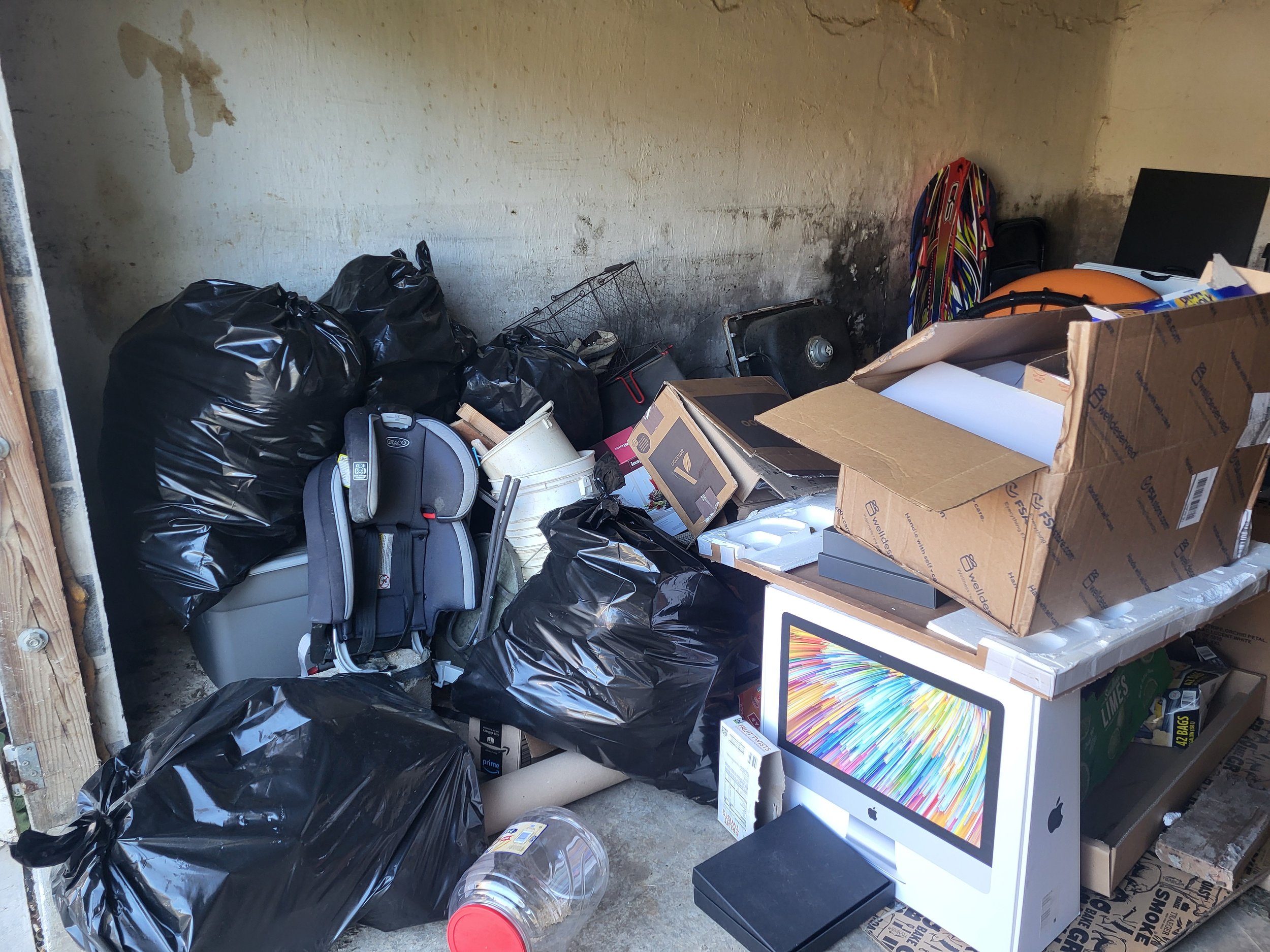 garage filled with trash
