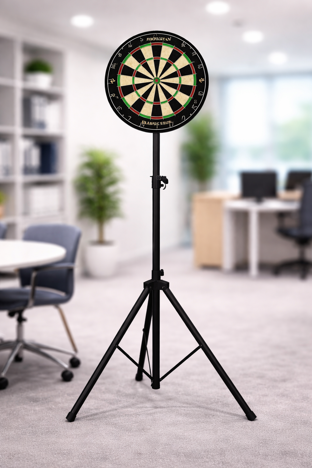 Indoor office with a dartboard on a tripod stand in the foreground, blurred background shows chairs, desks, plants, and shelves.