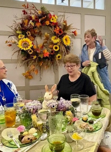 Bunny themed table with guests, food, and drink
