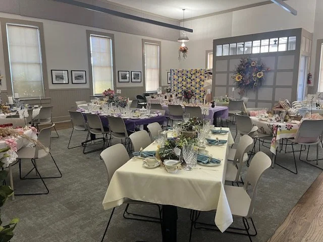 4 decorated tables before the show in Spring colors