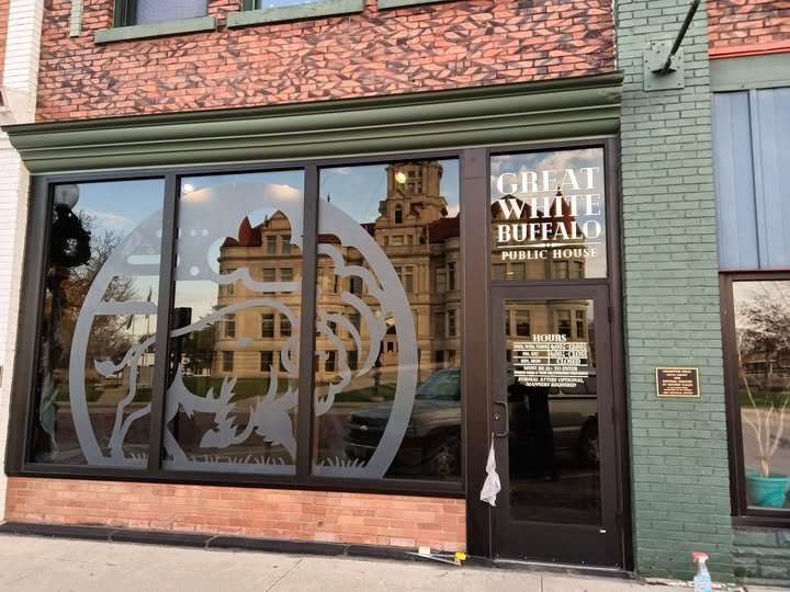 Front view of Great White Buffalo restaurant with sign done by Aztec signs