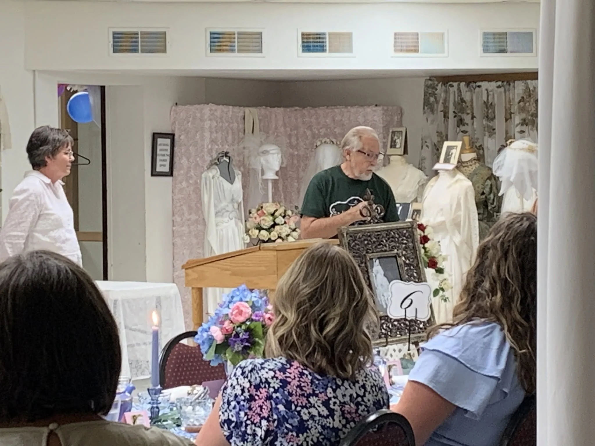 Aubrey presenting at the tea