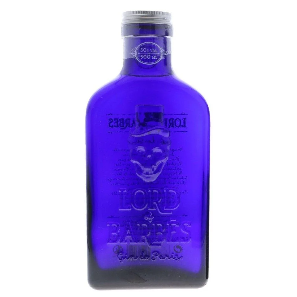 Bottiglia di vetro blu con etichetta incisa che dice 'Lord & Barbers, Eau de Parfume', con un volto sorridente stilizzato sopra la scritta.