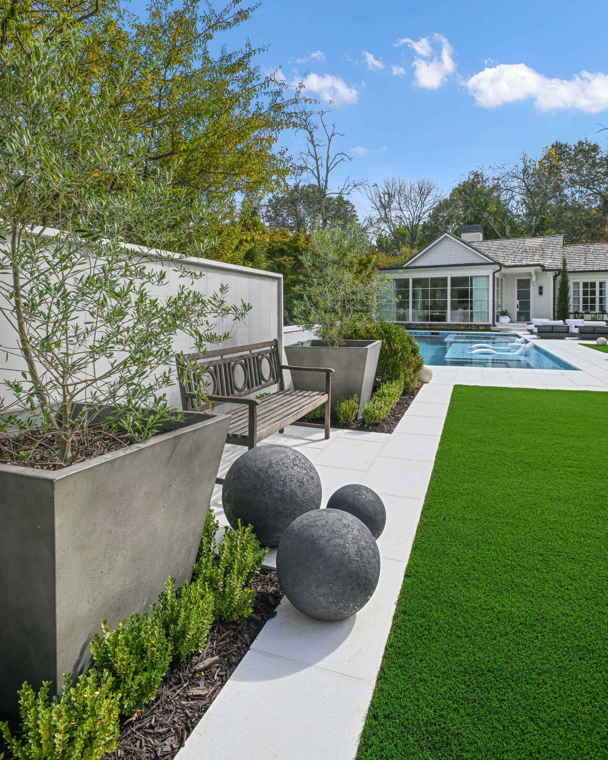 FireRock Oyster Concrete Pavers on a Pool Deck